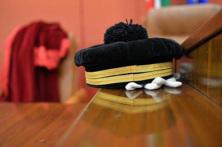 Il cappello da magistrato posato su uno scranno durante l'inaugurazione dell'anno giudiziario, Genova, 25 gennaio 2014. ANSA/LUCA ZENNARO